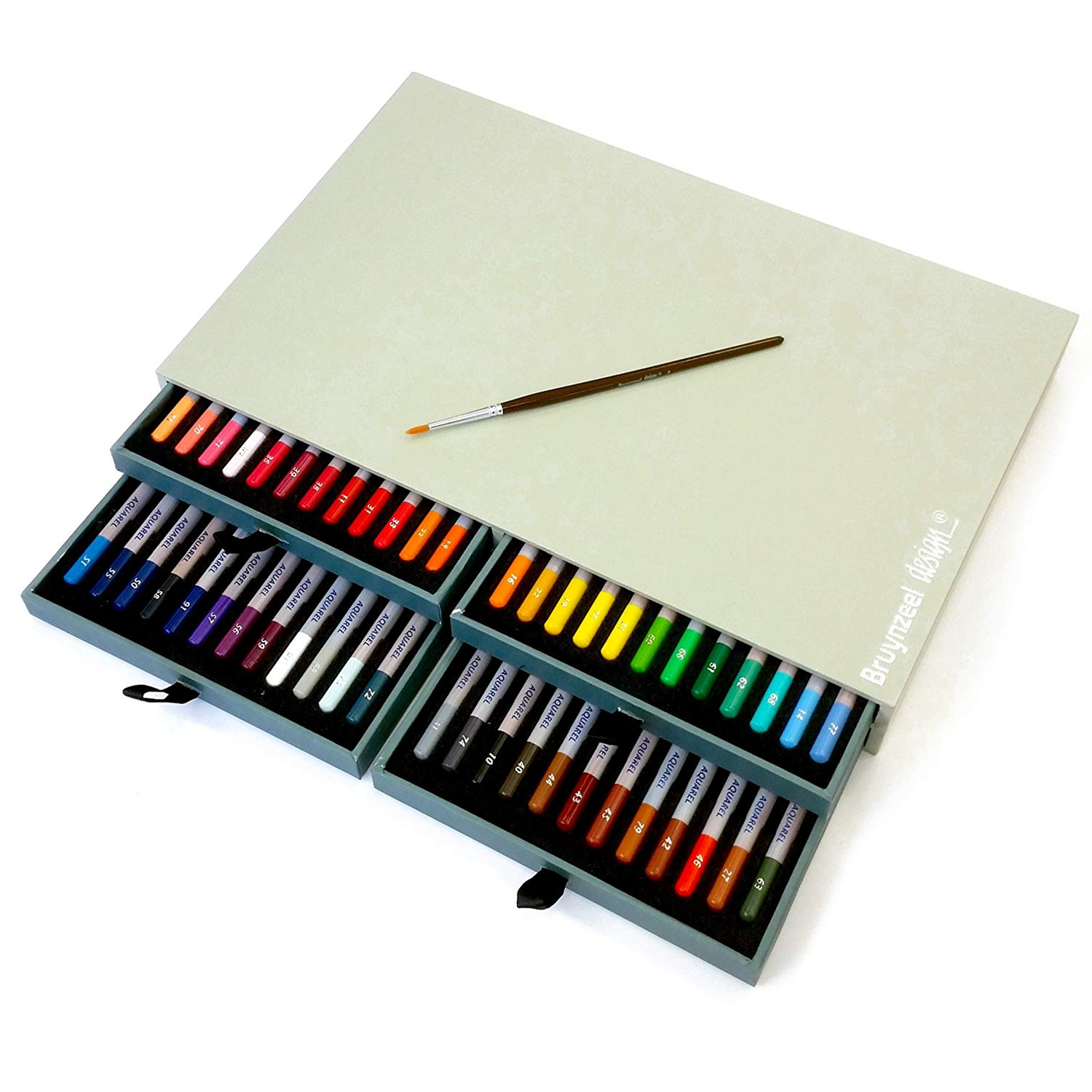 Drawing accessories set: brushes, pencils, watercolor, frame on brown  concrete. Side view Stock Photo by uladzimirz